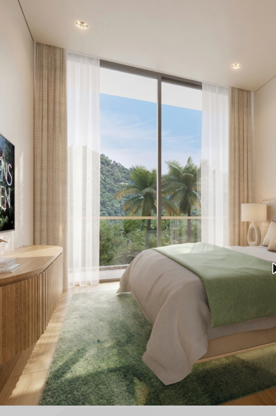 Schlafzimmer mit Balkon und Blick ins Grüne